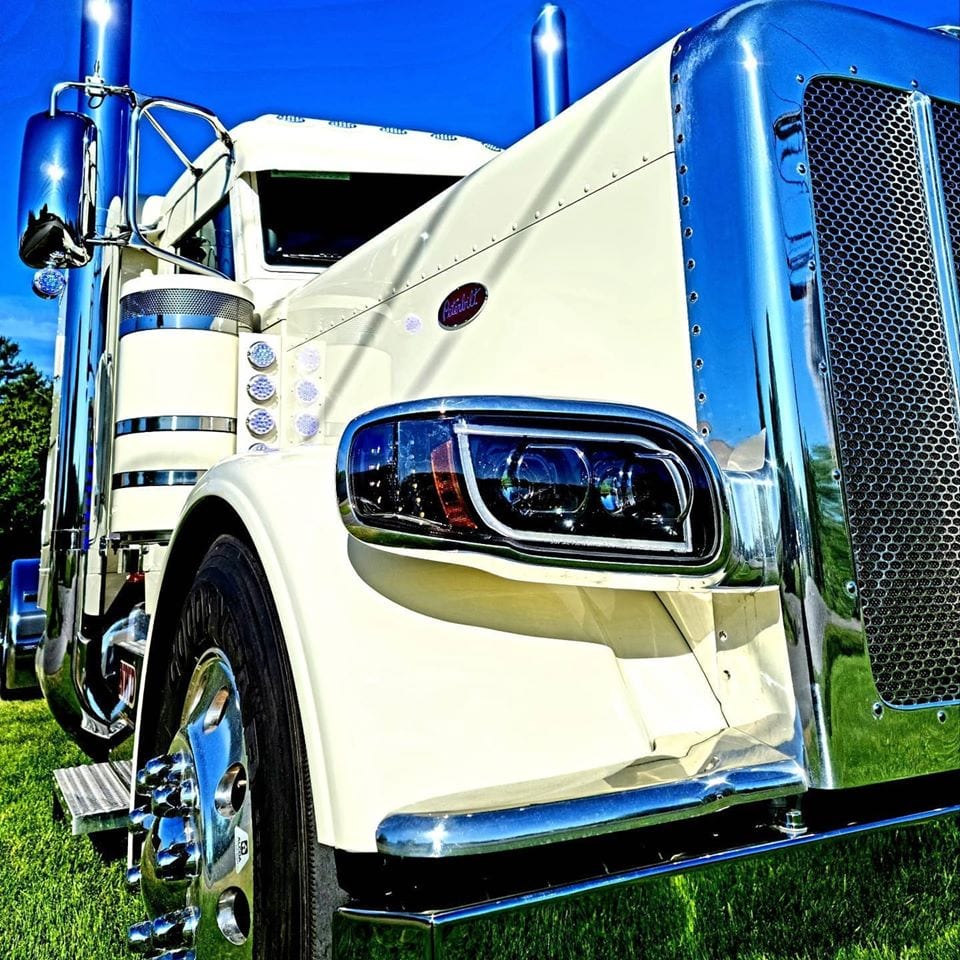 up close photo of big rig truck cab from the front